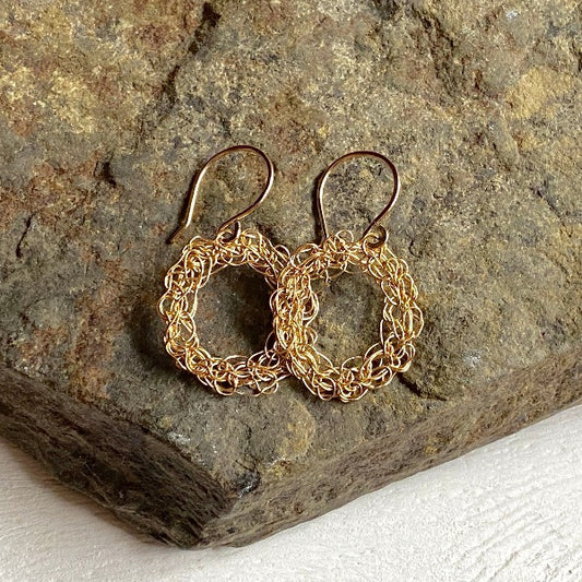 Gold Filled Crochet Earrings on rock background