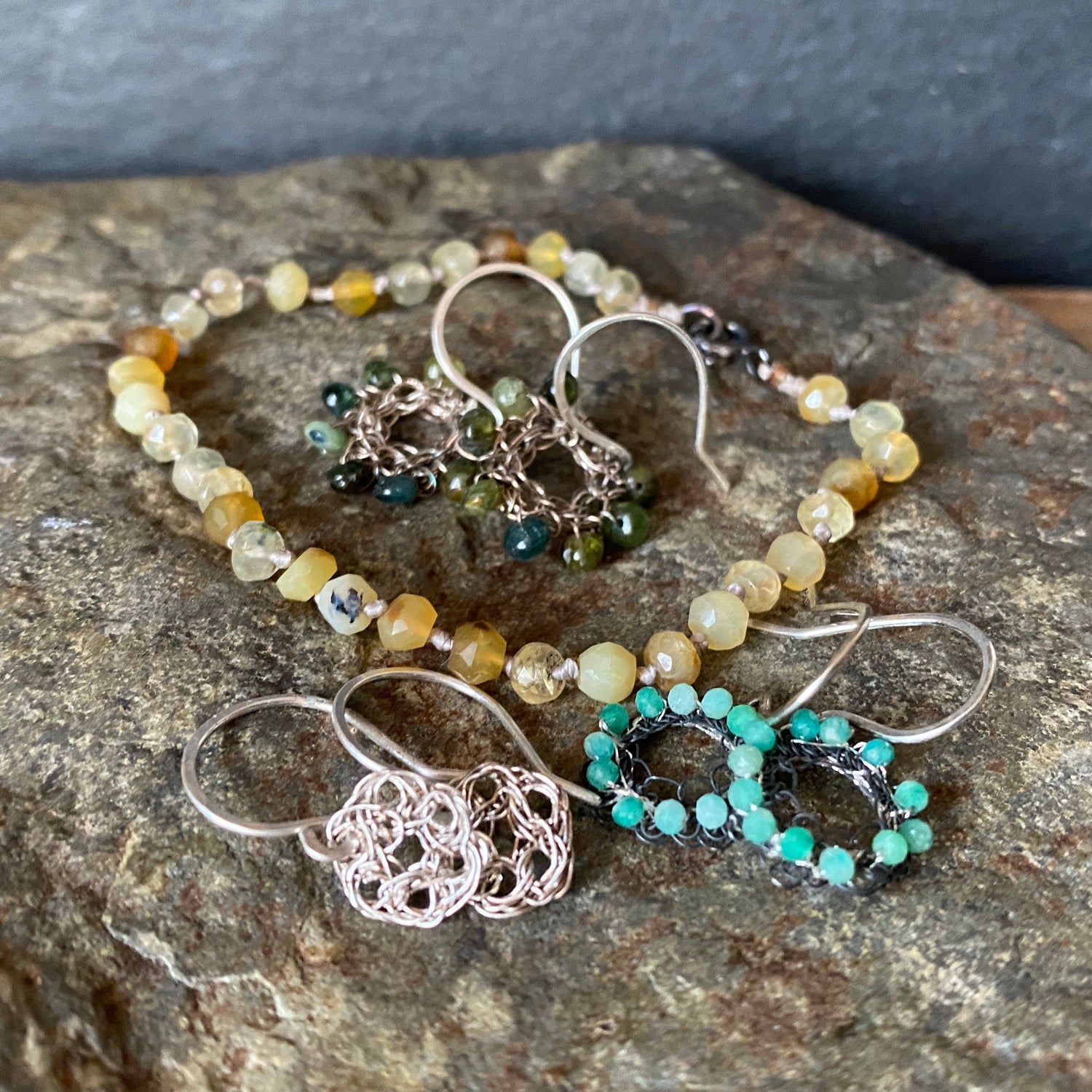 crochet silver earrings and woven bracelets 