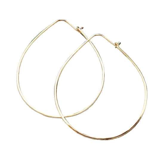 A pair of gold-colored hoop earrings.