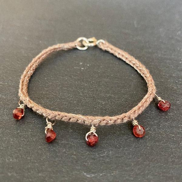 brown silk bracelet with red garnet beads
